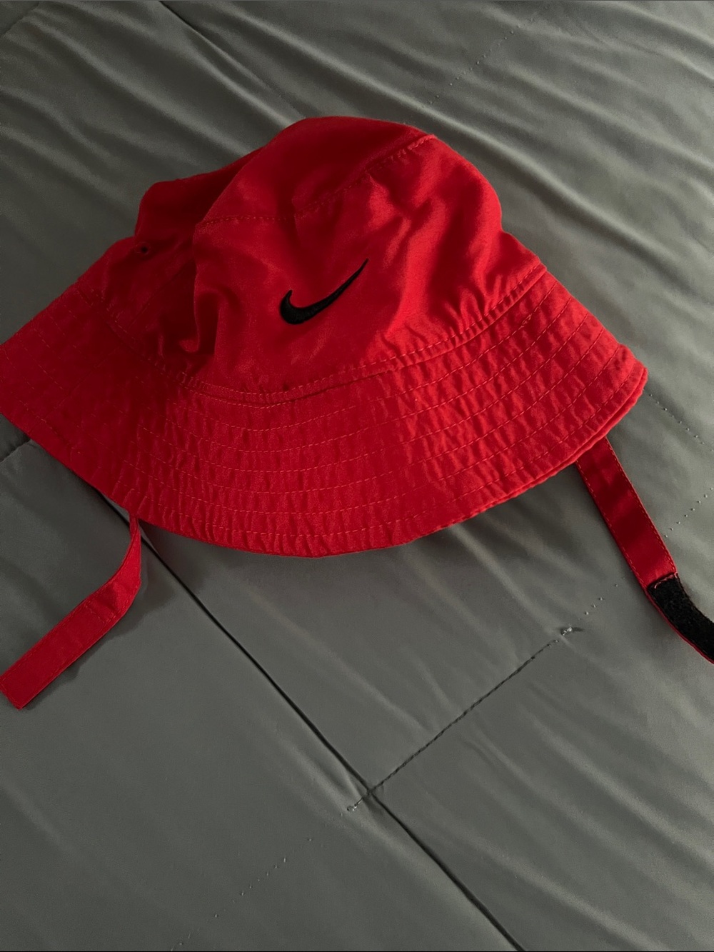 Nike INFANTS Red Bucket Hat with Black Swoosh and Chin Straps